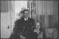 Man in uniform with woman