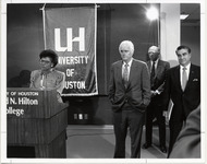 Marguerite Ross Barnett standing at a podium