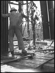 Man at oil well