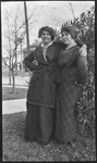 Two women with their arms around one another