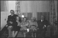 Group of people sitting on a couch