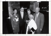 Roy H. Cullen standing with a group of four people