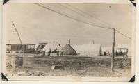 Men loitering at Stone & Webster Engineering camp at Virginia Point (close-up)