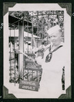 Sailor posing with a sloth
