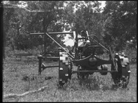 Tractor with a truck and hammock behind