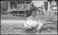 Girl sitting on grass
